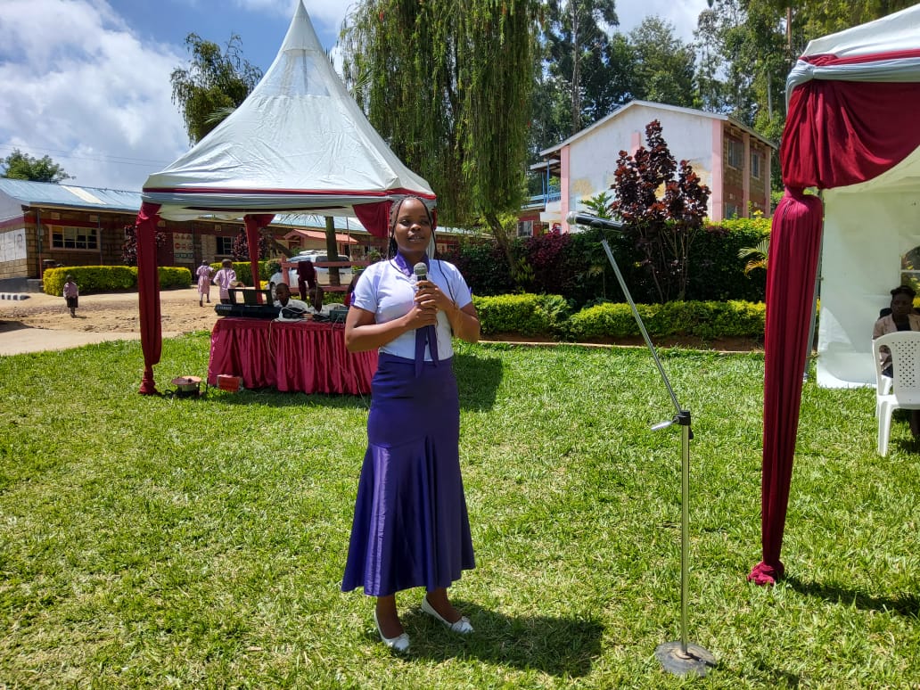 Head Teacher Justa Kinyua Making Remarks