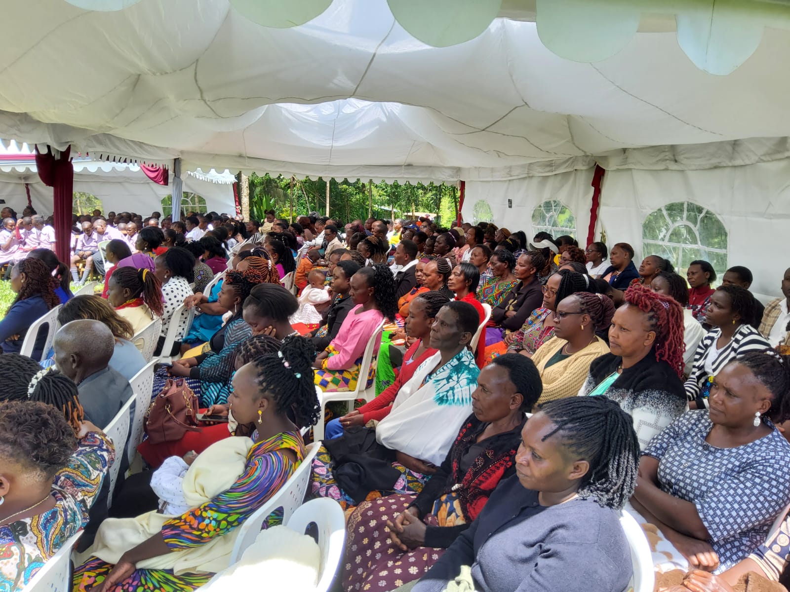 Parents Follow Proceedings during prize giving day